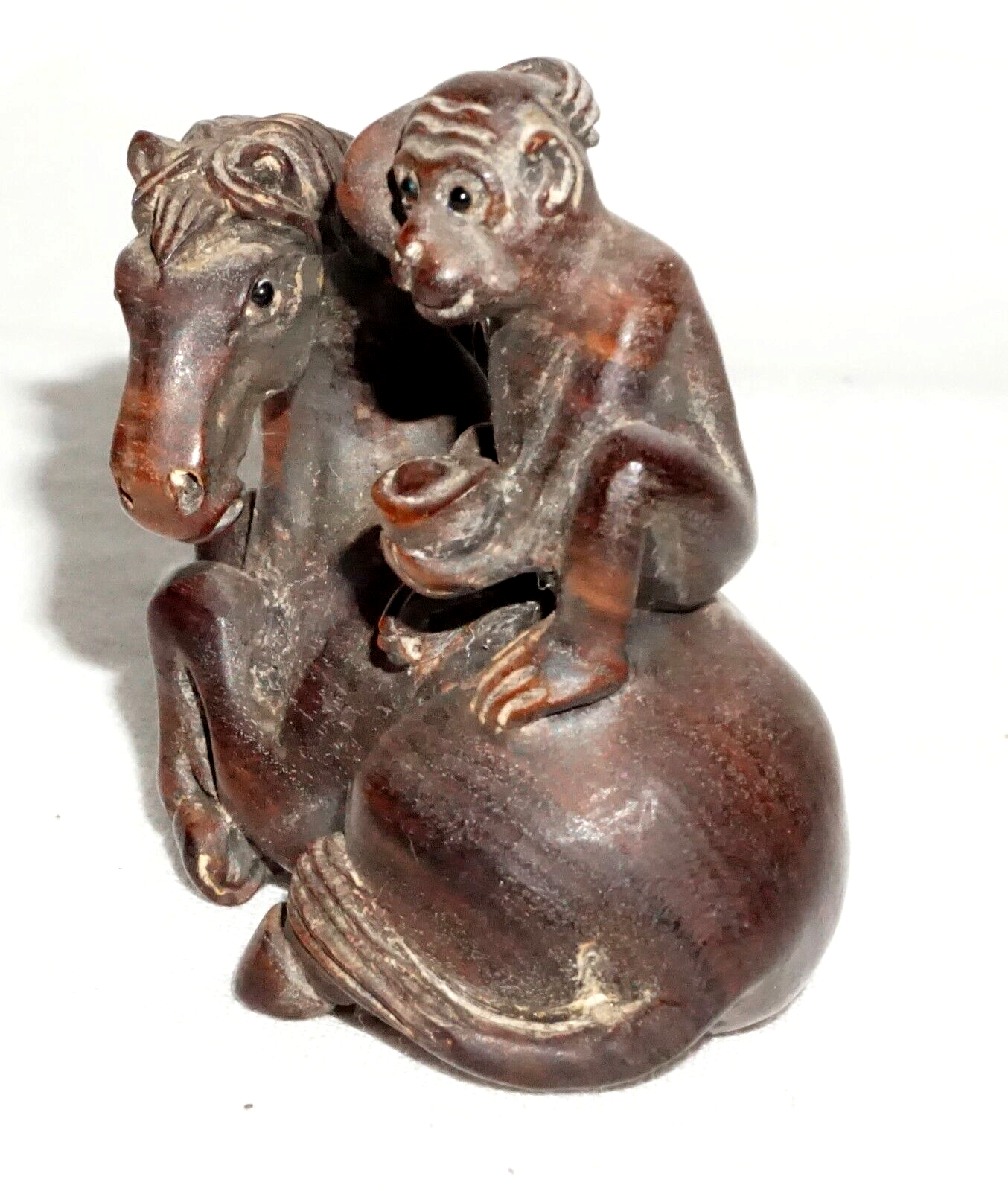 Vintage Japanese Carved Wooden Netsuke Monkey Seated on a Horse signed (FeH