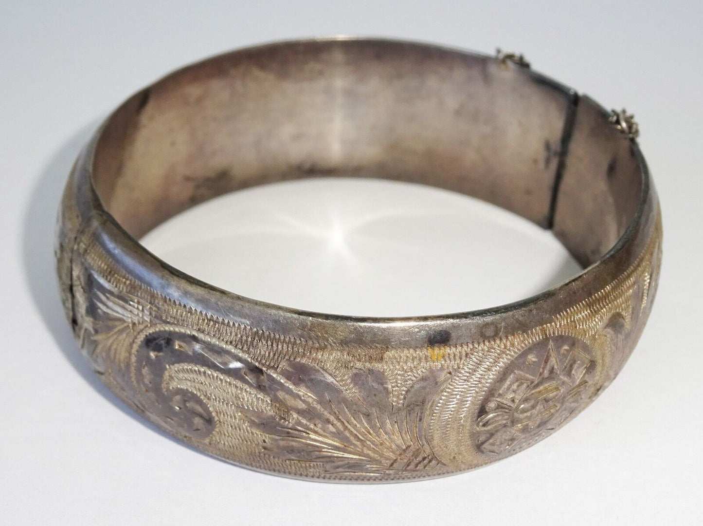 Mexican Hollow Sterling Silver Bangle Bracelet w. Etched Mask & Leaf Motifs(Yir)