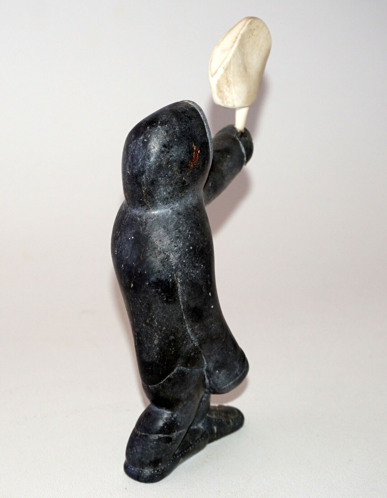 1979 Eskimo Stone Carved Sculpture Figure Holding Carved Object signed (Kor)