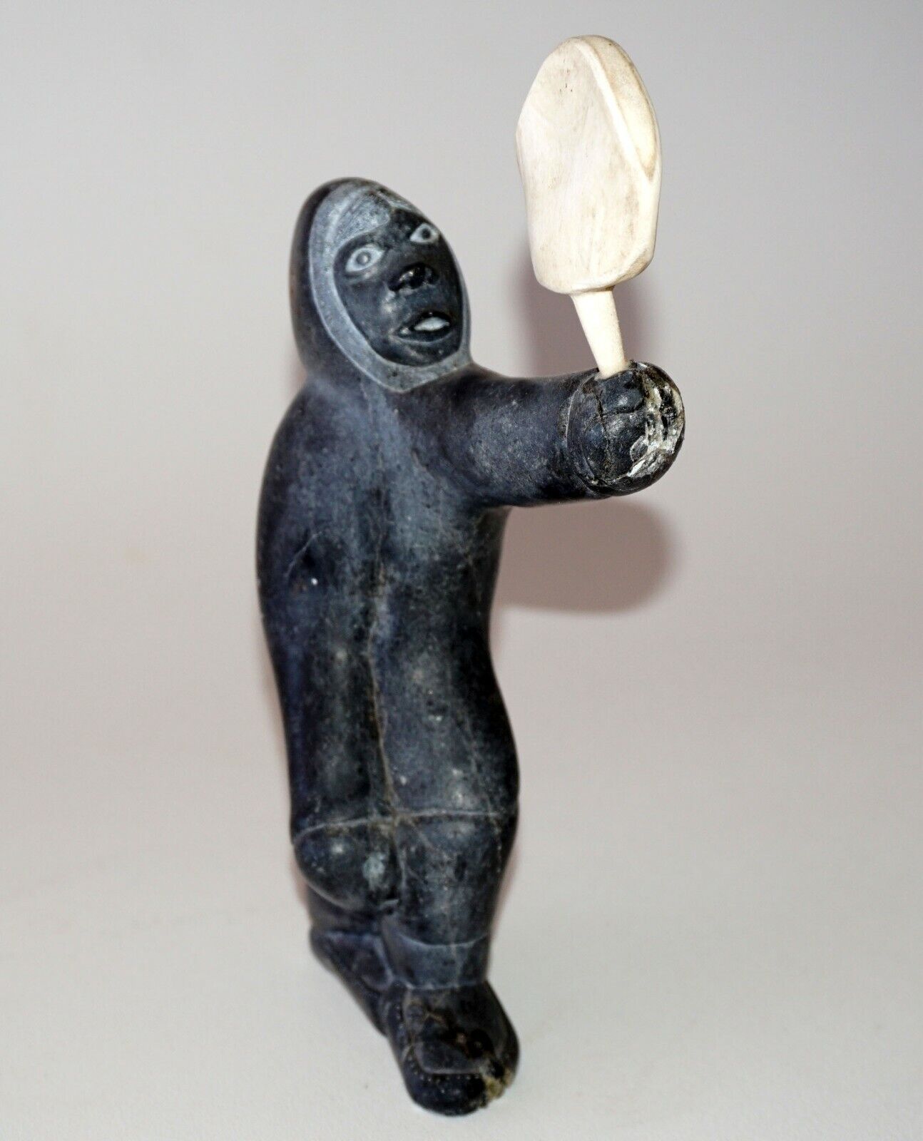 1979 Eskimo Stone Carved Sculpture Figure Holding Carved Object signed (Kor)