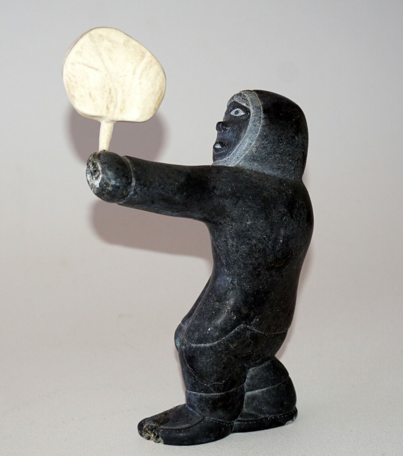 1979 Eskimo Stone Carved Sculpture Figure Holding Carved Object signed (Kor)