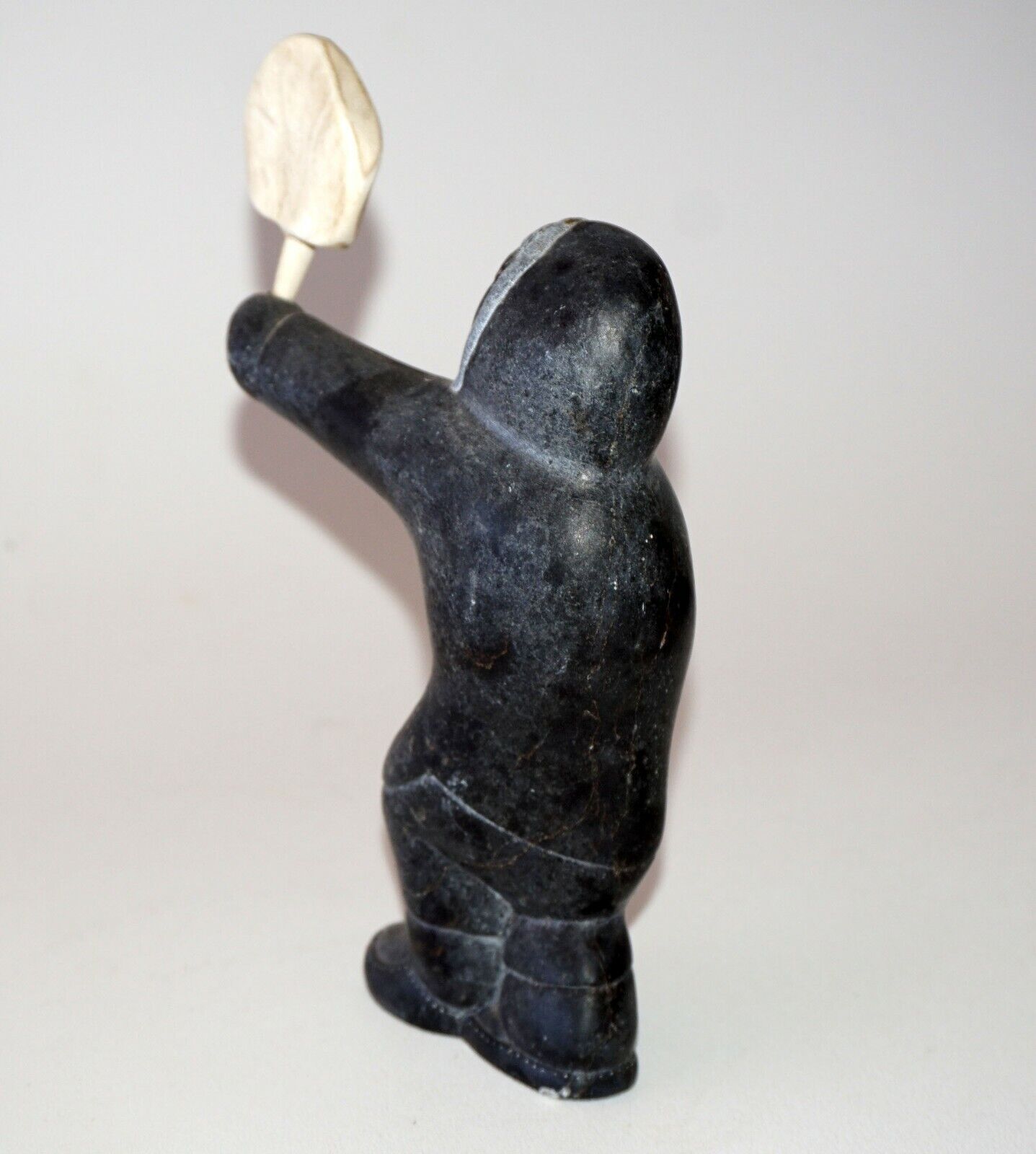 1979 Eskimo Stone Carved Sculpture Figure Holding Carved Object signed (Kor)