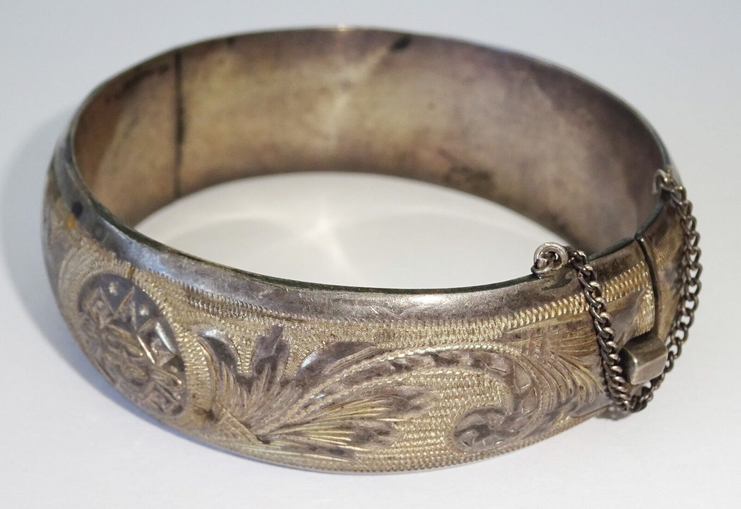 Mexican Hollow Sterling Silver Bangle Bracelet w. Etched Mask & Leaf Motifs(Yir)