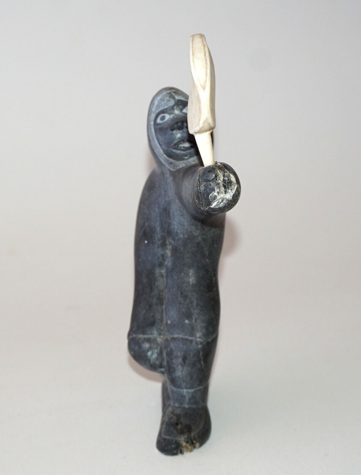 1979 Eskimo Stone Carved Sculpture Figure Holding Carved Object signed (Kor)